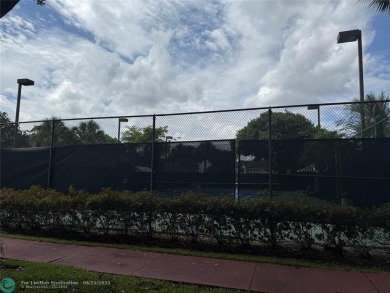 Well maintained and very spacious 3/2.5 townhome in Woodmont on  in Florida - for sale on GolfHomes.com, golf home, golf lot