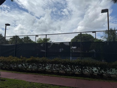 Well maintained and very spacious 3/2.5 townhome in Woodmont on  in Florida - for sale on GolfHomes.com, golf home, golf lot