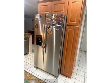 Well maintained and very spacious 3/2.5 townhome in Woodmont on  in Florida - for sale on GolfHomes.com, golf home, golf lot
