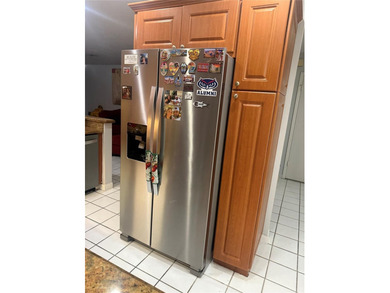 Well maintained and very spacious 3/2.5 townhome in Woodmont on  in Florida - for sale on GolfHomes.com, golf home, golf lot