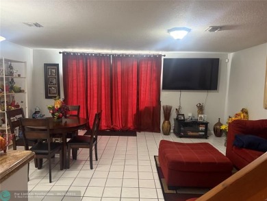 Well maintained and very spacious 3/2.5 townhome in Woodmont on  in Florida - for sale on GolfHomes.com, golf home, golf lot