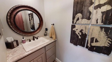 Welcome to your dream home! This beautiful 5 bed 3 bath ranch on Paradise Valley Country Club in Wyoming - for sale on GolfHomes.com, golf home, golf lot