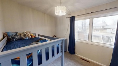 Welcome to your dream home! This beautiful 5 bed 3 bath ranch on Paradise Valley Country Club in Wyoming - for sale on GolfHomes.com, golf home, golf lot