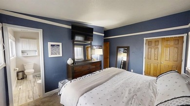 Welcome to your dream home! This beautiful 5 bed 3 bath ranch on Paradise Valley Country Club in Wyoming - for sale on GolfHomes.com, golf home, golf lot