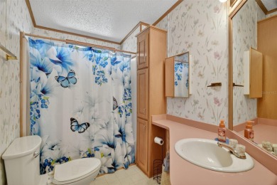 Located in the desirable Fox Run 55+ community, this on Bay Tree Golf Course in Florida - for sale on GolfHomes.com, golf home, golf lot
