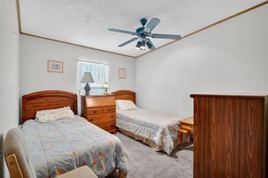 Located in the desirable Fox Run 55+ community, this on Bay Tree Golf Course in Florida - for sale on GolfHomes.com, golf home, golf lot