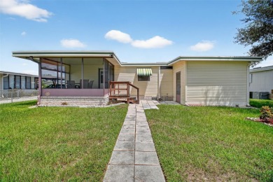 Located in the desirable Fox Run 55+ community, this on Bay Tree Golf Course in Florida - for sale on GolfHomes.com, golf home, golf lot