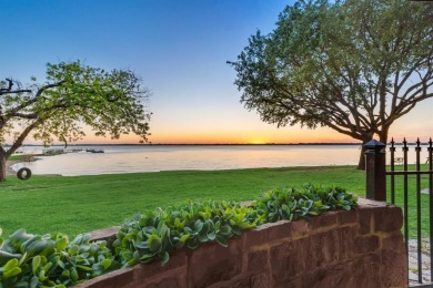 Stunning WATERFRONT townhome in a Mediterranean Style, gated on Lakeside Village Golf Course in Texas - for sale on GolfHomes.com, golf home, golf lot