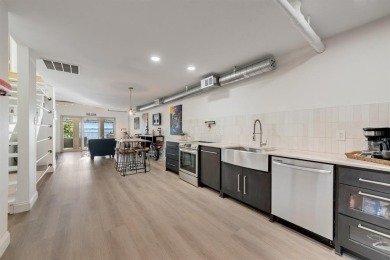 Stunning WATERFRONT townhome in a Mediterranean Style, gated on Lakeside Village Golf Course in Texas - for sale on GolfHomes.com, golf home, golf lot