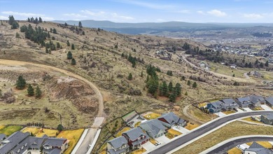 Discover luxury living in Legacy Ridge, Liberty Lake's premier on Trailhead At Liberty Lake in Washington - for sale on GolfHomes.com, golf home, golf lot