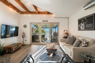 Stunning WATERFRONT townhome in a Mediterranean Style, gated on Lakeside Village Golf Course in Texas - for sale on GolfHomes.com, golf home, golf lot