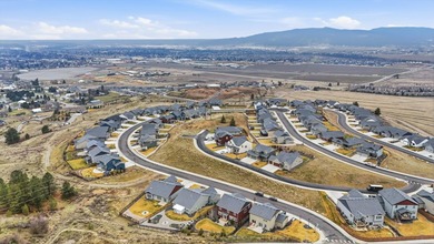 Discover luxury living in Legacy Ridge, Liberty Lake's premier on Trailhead At Liberty Lake in Washington - for sale on GolfHomes.com, golf home, golf lot