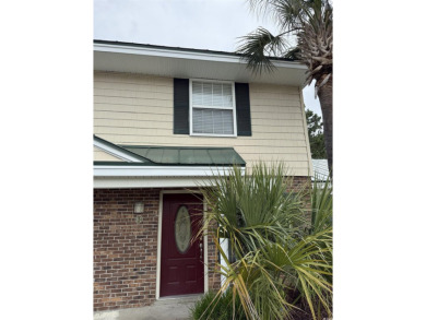 Two Bedroom, one and one half bath unit across the street from on The Hackler Course at Coastal Carolina University in South Carolina - for sale on GolfHomes.com, golf home, golf lot