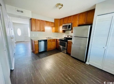 Two Bedroom, one and one half bath unit across the street from on The Hackler Course at Coastal Carolina University in South Carolina - for sale on GolfHomes.com, golf home, golf lot