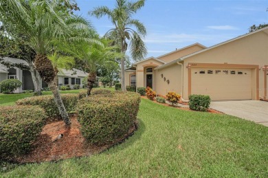 Best value in the neighborhood with easy, LOW-MAINTENANCE living on Meadow Oaks Golf and Country Club in Florida - for sale on GolfHomes.com, golf home, golf lot