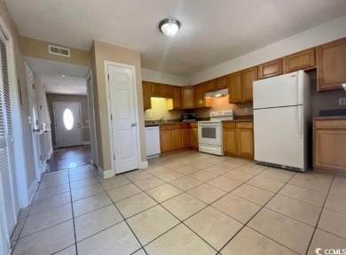 Two Bedroom, one and one half bath unit across the street from on The Hackler Course at Coastal Carolina University in South Carolina - for sale on GolfHomes.com, golf home, golf lot