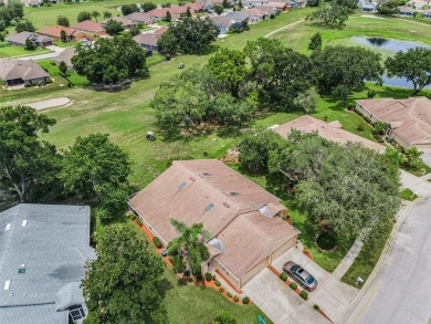 Best value in the neighborhood with easy, LOW-MAINTENANCE living on Meadow Oaks Golf and Country Club in Florida - for sale on GolfHomes.com, golf home, golf lot