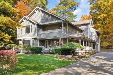 Discover the charm and serenity of lakeside living in this newly on Harbor Point Golf Club in Michigan - for sale on GolfHomes.com, golf home, golf lot