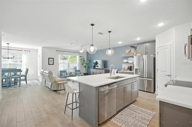 Discover the perfect blend of elegance, comfort, and private on The Grand Club - Pine Lakes Course in Florida - for sale on GolfHomes.com, golf home, golf lot