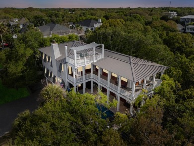 Live at the Beach in this custom built beach house by esteemed on Wild Dunes Harbor Golf Resort in South Carolina - for sale on GolfHomes.com, golf home, golf lot