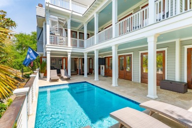 Live at the Beach in this custom built beach house by esteemed on Wild Dunes Harbor Golf Resort in South Carolina - for sale on GolfHomes.com, golf home, golf lot
