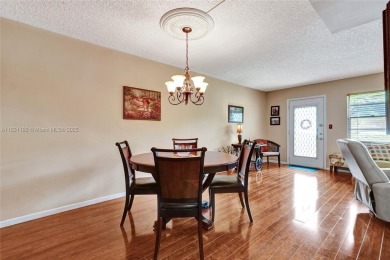 Welcome to your new home in the beautiful community of Wynmoor! on Wynmoor Golf Course in Florida - for sale on GolfHomes.com, golf home, golf lot