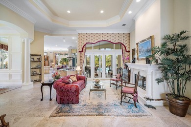 Located on over 1/2 acre, this custom 4 bed, 4 bath estate on Old Marsh Golf Club in Florida - for sale on GolfHomes.com, golf home, golf lot