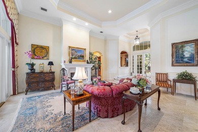 Located on over 1/2 acre, this custom 4 bed, 4 bath estate on Old Marsh Golf Club in Florida - for sale on GolfHomes.com, golf home, golf lot