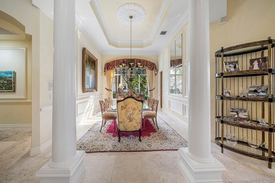 Located on over 1/2 acre, this custom 4 bed, 4 bath estate on Old Marsh Golf Club in Florida - for sale on GolfHomes.com, golf home, golf lot