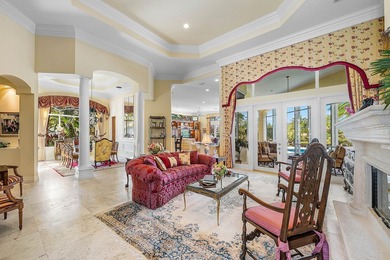 Located on over 1/2 acre, this custom 4 bed, 4 bath estate on Old Marsh Golf Club in Florida - for sale on GolfHomes.com, golf home, golf lot