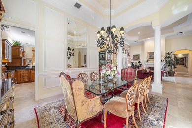 Located on over 1/2 acre, this custom 4 bed, 4 bath estate on Old Marsh Golf Club in Florida - for sale on GolfHomes.com, golf home, golf lot