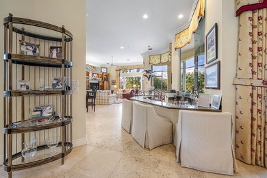 Located on over 1/2 acre, this custom 4 bed, 4 bath estate on Old Marsh Golf Club in Florida - for sale on GolfHomes.com, golf home, golf lot