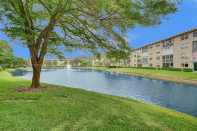 Welcome to your new home in the beautiful community of Wynmoor! on Wynmoor Golf Course in Florida - for sale on GolfHomes.com, golf home, golf lot