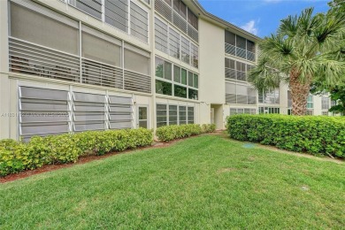 Welcome to your new home in the beautiful community of Wynmoor! on Wynmoor Golf Course in Florida - for sale on GolfHomes.com, golf home, golf lot