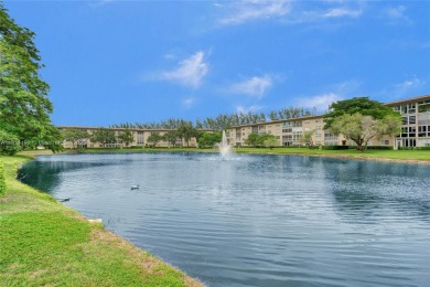 Welcome to your new home in the beautiful community of Wynmoor! on Wynmoor Golf Course in Florida - for sale on GolfHomes.com, golf home, golf lot