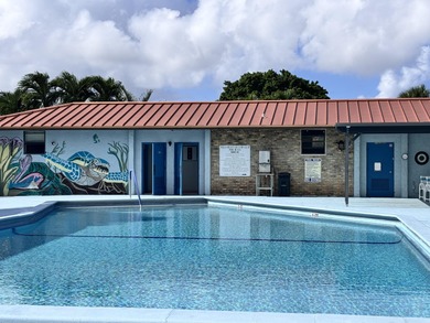 Sheer Elegance. Beautifully renovated 3-BEDROOM, END-UNIT condo on Miles Grant Country Club in Florida - for sale on GolfHomes.com, golf home, golf lot