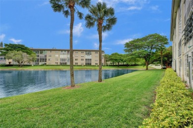 Welcome to your new home in the beautiful community of Wynmoor! on Wynmoor Golf Course in Florida - for sale on GolfHomes.com, golf home, golf lot