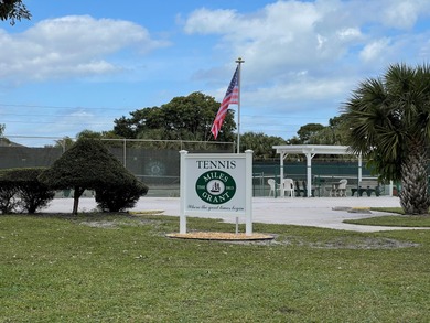 Sheer Elegance. Beautifully renovated 3-BEDROOM, END-UNIT condo on Miles Grant Country Club in Florida - for sale on GolfHomes.com, golf home, golf lot