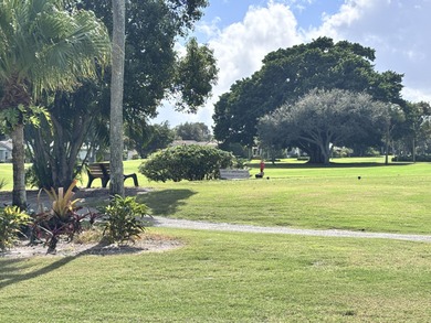 Sheer Elegance. Beautifully renovated 3-BEDROOM, END-UNIT condo on Miles Grant Country Club in Florida - for sale on GolfHomes.com, golf home, golf lot
