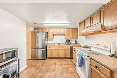 This home is a must see! The first floor boasts a functional on Raven Golf Club At South Mountain in Arizona - for sale on GolfHomes.com, golf home, golf lot