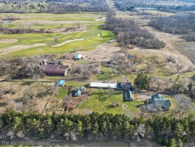 23 secluded acres, this extraordinary property is a blend of on Fox Hills Golf and Banquet Center -  in Michigan - for sale on GolfHomes.com, golf home, golf lot