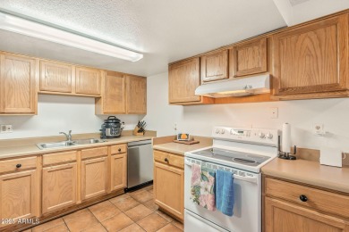 This home is a must see! The first floor boasts a functional on Raven Golf Club At South Mountain in Arizona - for sale on GolfHomes.com, golf home, golf lot