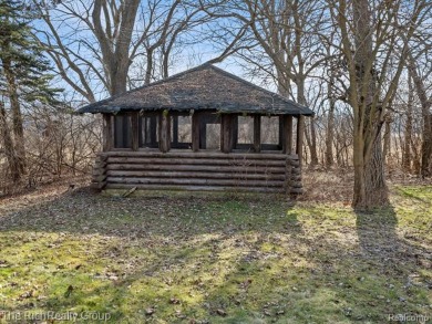 23 secluded acres, this extraordinary property is a blend of on Fox Hills Golf and Banquet Center -  in Michigan - for sale on GolfHomes.com, golf home, golf lot