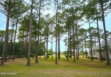 Awesome building lot with golf and pond views from your on Ocean Ridge Plantation in North Carolina - for sale on GolfHomes.com, golf home, golf lot