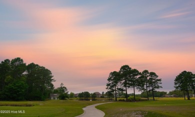 Awesome building lot with golf and pond views from your on Ocean Ridge Plantation in North Carolina - for sale on GolfHomes.com, golf home, golf lot