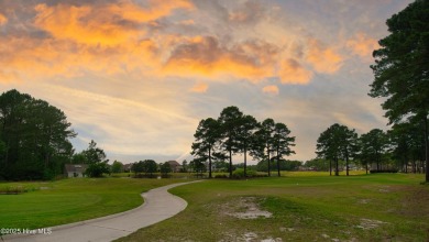 Awesome building lot with golf and pond views from your on Ocean Ridge Plantation in North Carolina - for sale on GolfHomes.com, golf home, golf lot