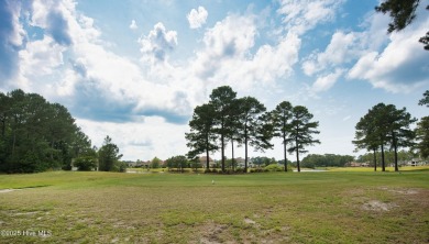 Awesome building lot with golf and pond views from your on Ocean Ridge Plantation in North Carolina - for sale on GolfHomes.com, golf home, golf lot