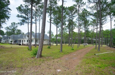 Awesome building lot with golf and pond views from your on Ocean Ridge Plantation in North Carolina - for sale on GolfHomes.com, golf home, golf lot