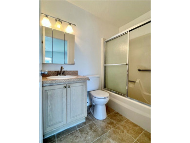 Charming 1st floor corner unit condominium One bedroom one- and on The American Golf Club in Florida - for sale on GolfHomes.com, golf home, golf lot