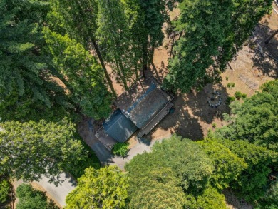 Escape to your dream mountain retreat! This spacious modified on Sequoia Woods Country Club in California - for sale on GolfHomes.com, golf home, golf lot